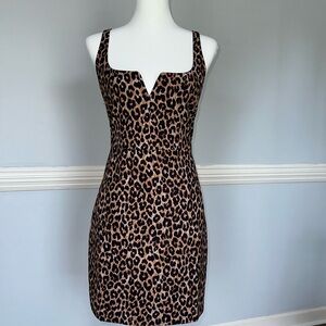 Likely cheetah print dress